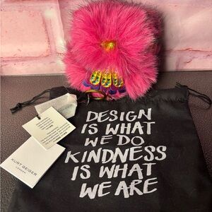 Kurt Geiger Pink Fuzzy Pom-Pom Charm with Jeweled Claw Detail